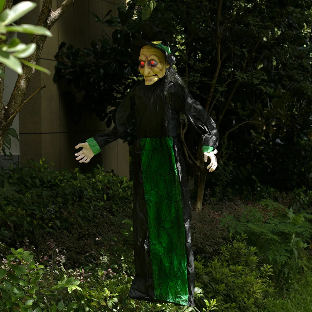 Sound-activated Halloween witch in a garden scene